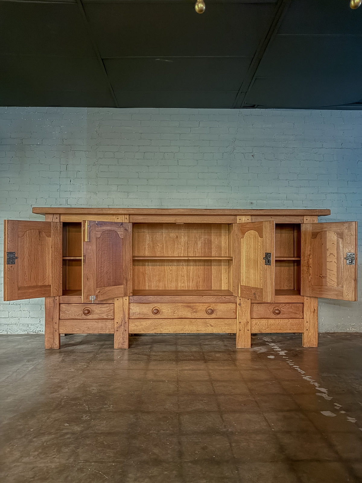 Mid 1900s Rustic French Light Oak Paneled Sideboard