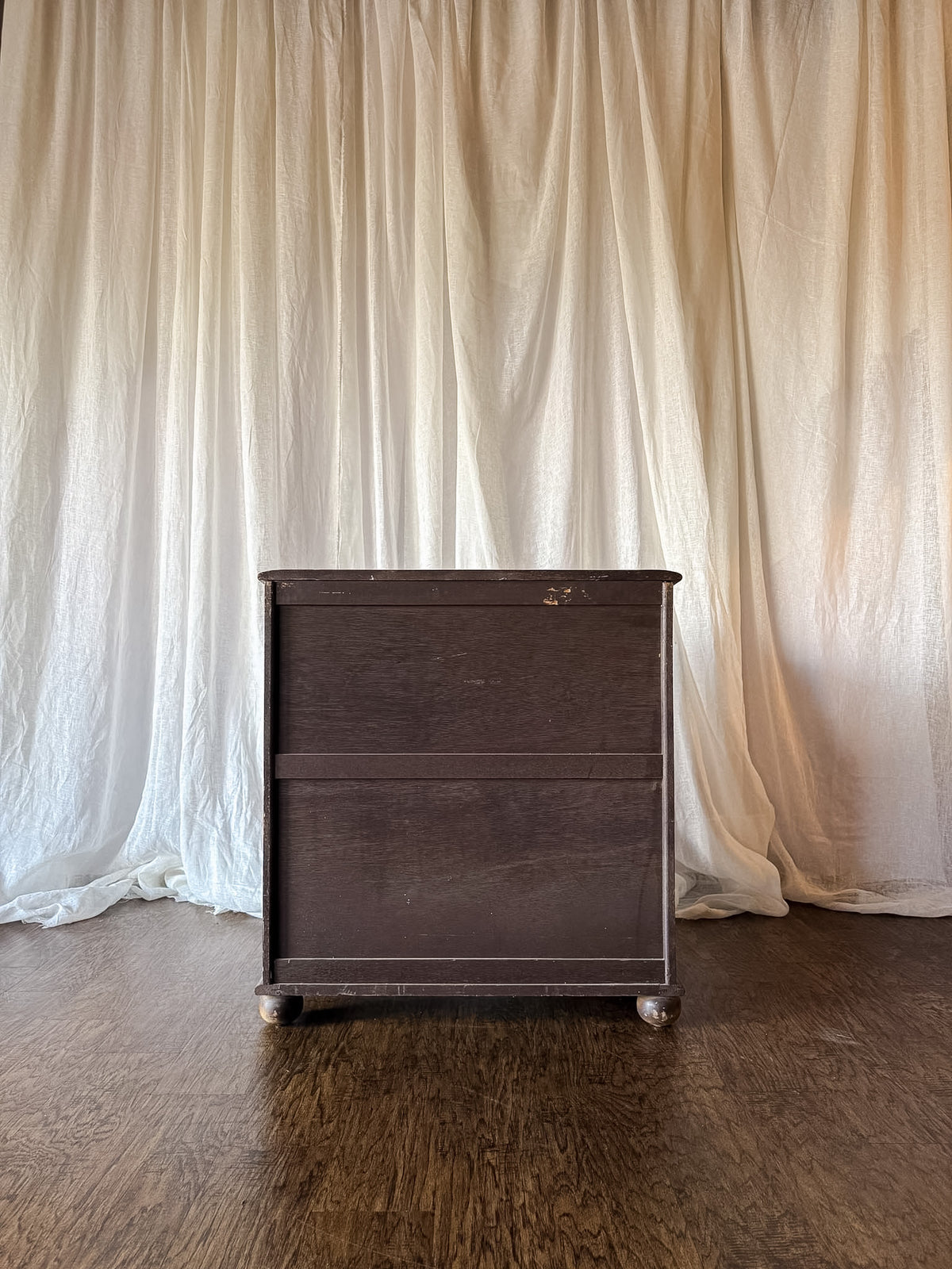 Early 20th Century Four Drawer Oak Chest with Bun Feet