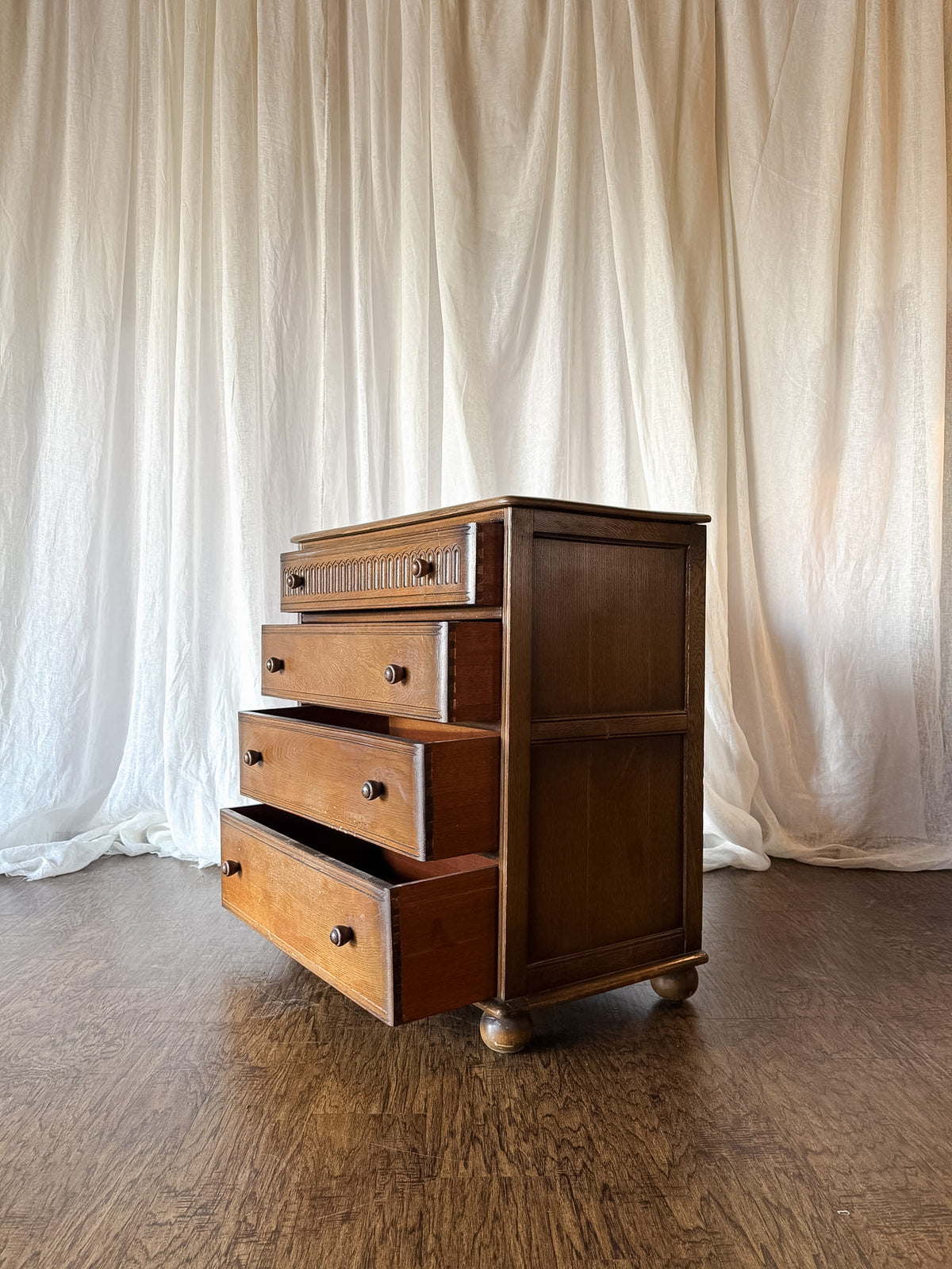 Early 20th Century Four Drawer Oak Chest with Bun Feet