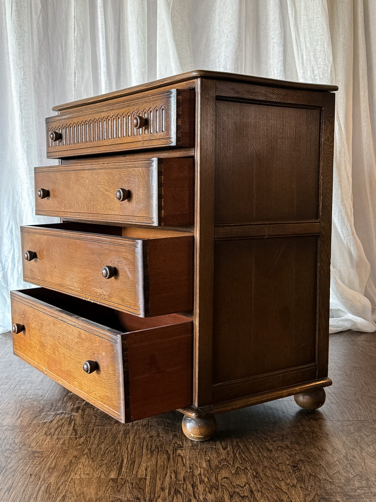 Early 20th Century Four Drawer Oak Chest with Bun Feet