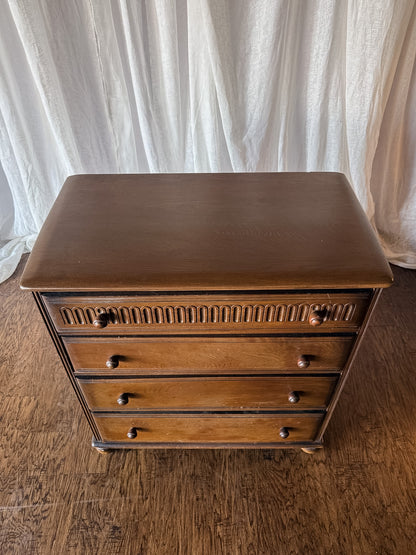 Early 20th Century Four Drawer Oak Chest with Bun Feet