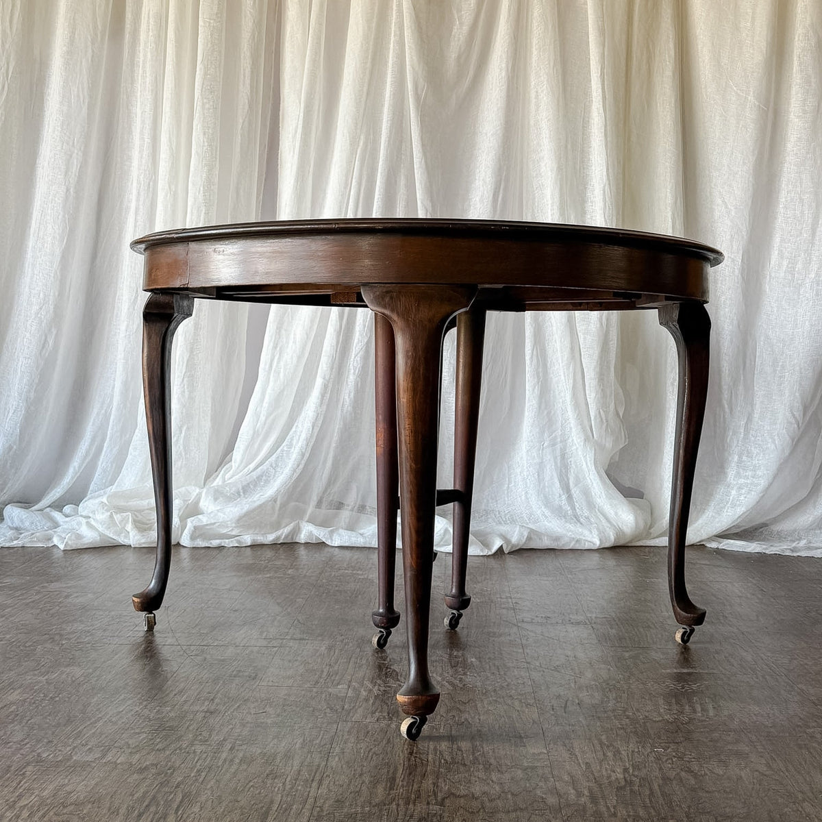 Traditional Round Dining Table on Casters