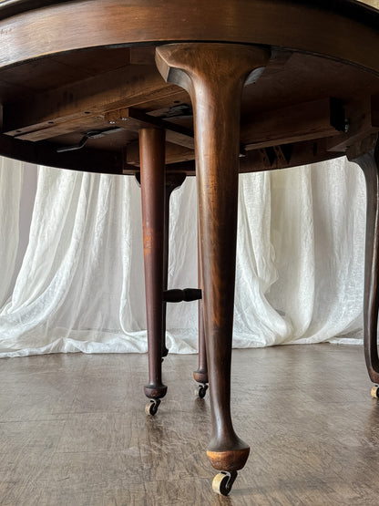 Traditional Round Dining Table on Casters