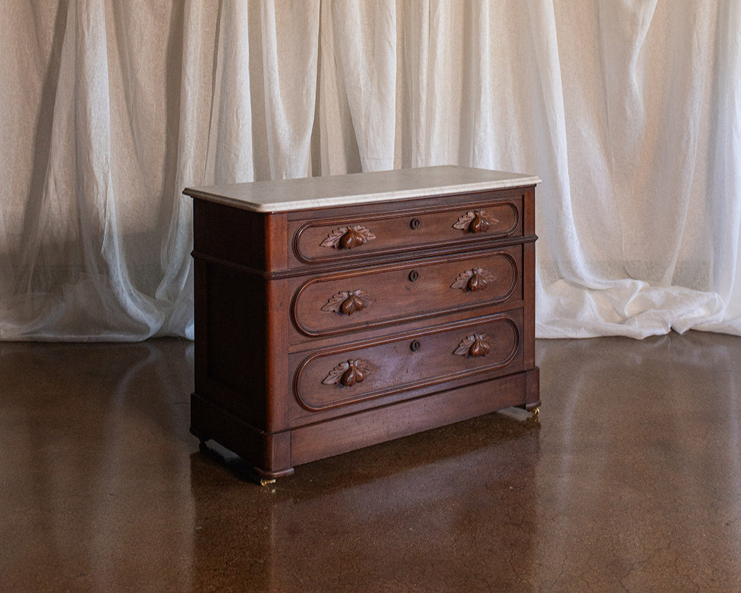 Three Drawer Walnut Chest with Carved Fruit Pulls and Marble Top on Casters - Mid to late 19th Century