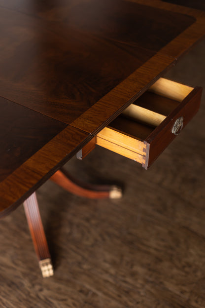 Mahogany Drop-Leaf Pedestal Table with Brass-Capped Feet