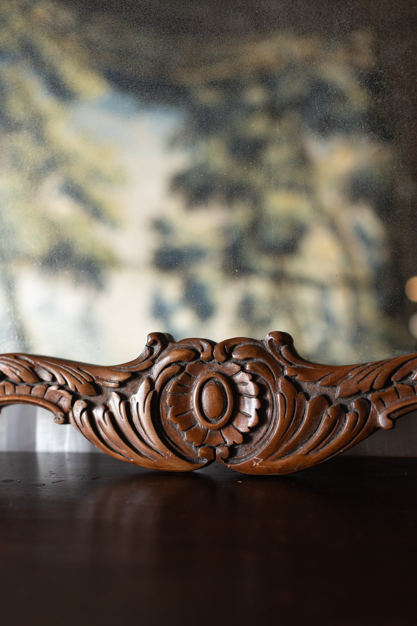 Carved Wood Wall Mirror with Scrolled Crest Frame