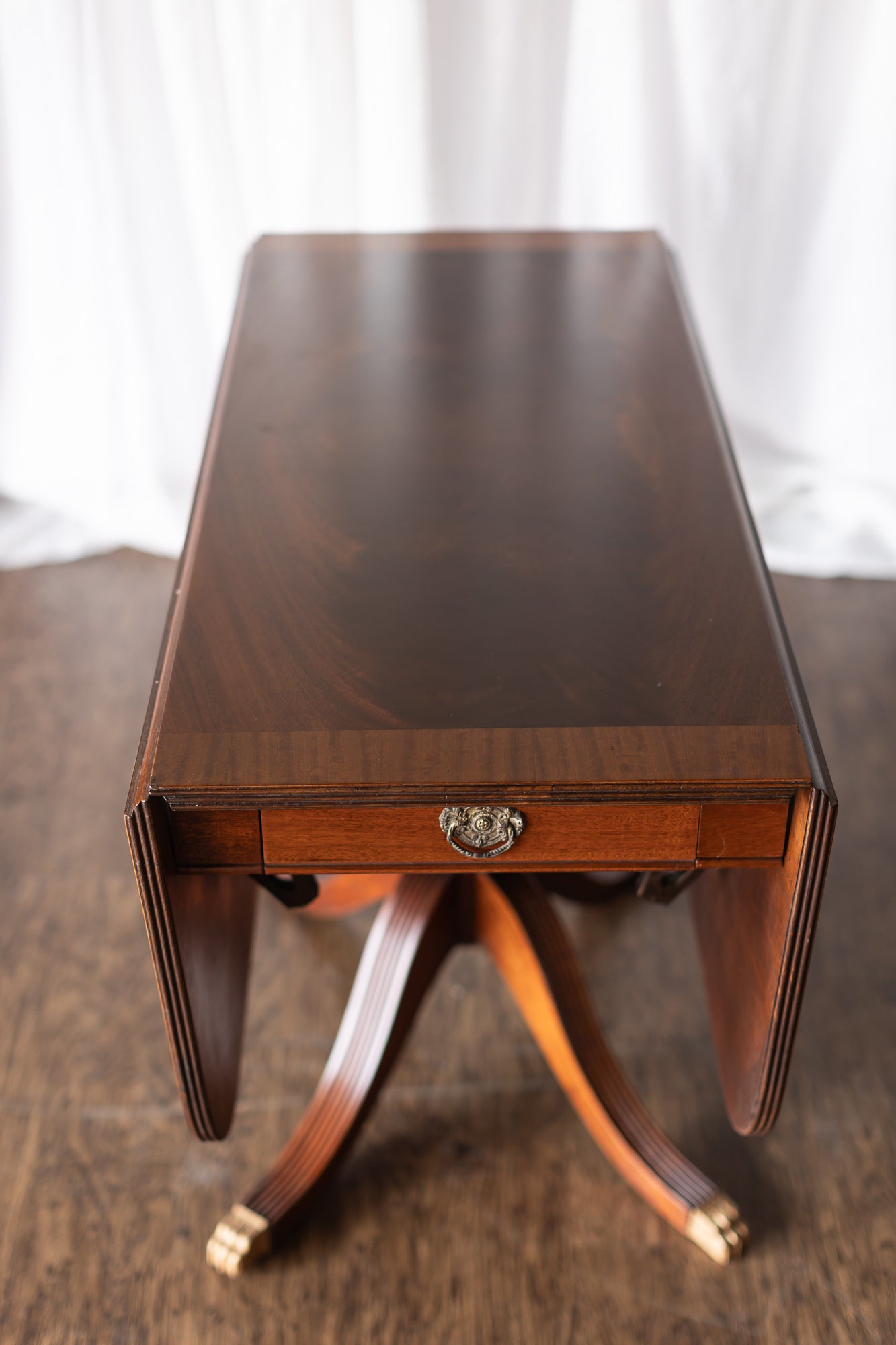 Mahogany Drop-Leaf Pedestal Table with Brass-Capped Feet