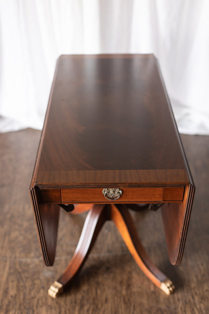 Mahogany Drop-Leaf Pedestal Table with Brass-Capped Feet