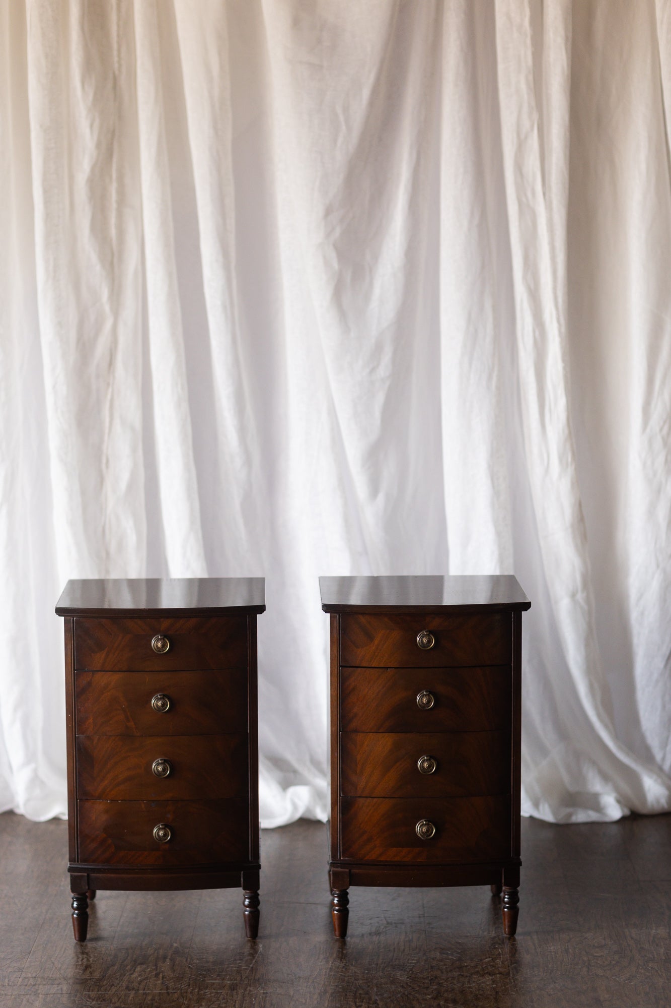 Pair of Four Drawer Nightstands with Turned Feet