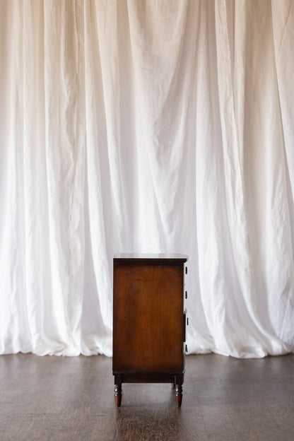 Pair of Four Drawer Nightstands with Turned Feet