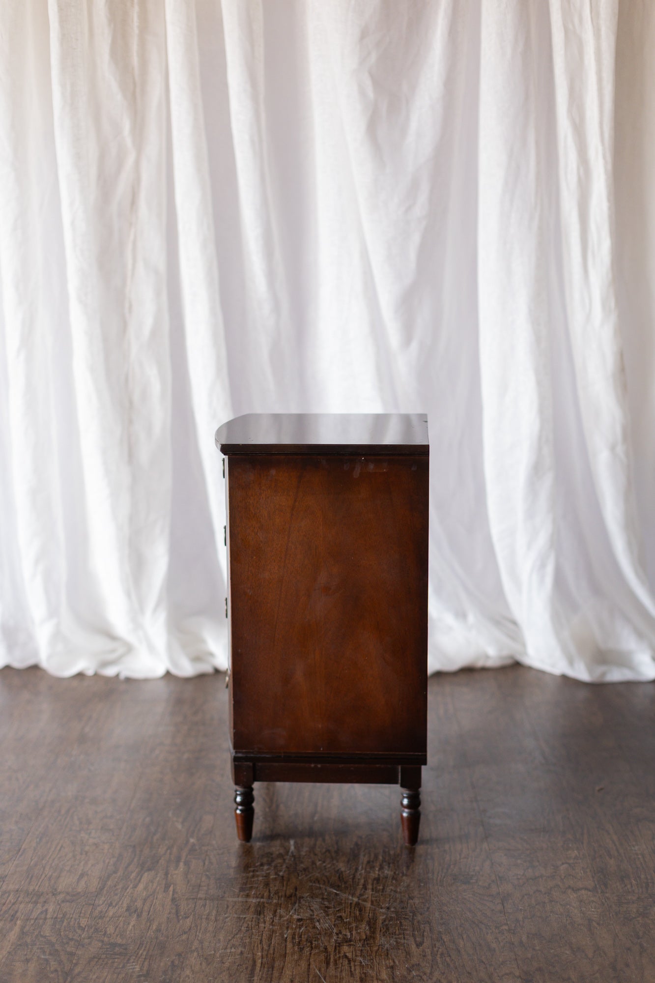 Pair of Four Drawer Nightstands with Turned Feet