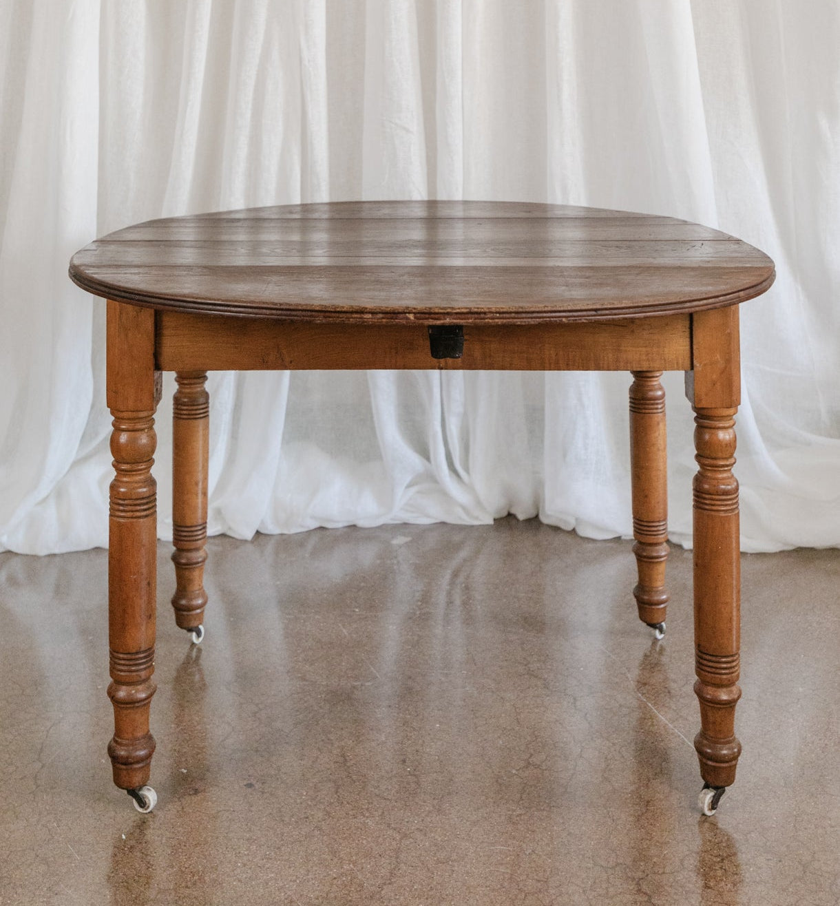 Oak Drop Leaf Table on Casters